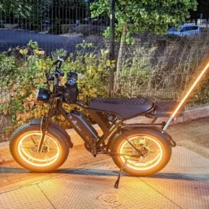 Glowing electric bike with flag at night.
